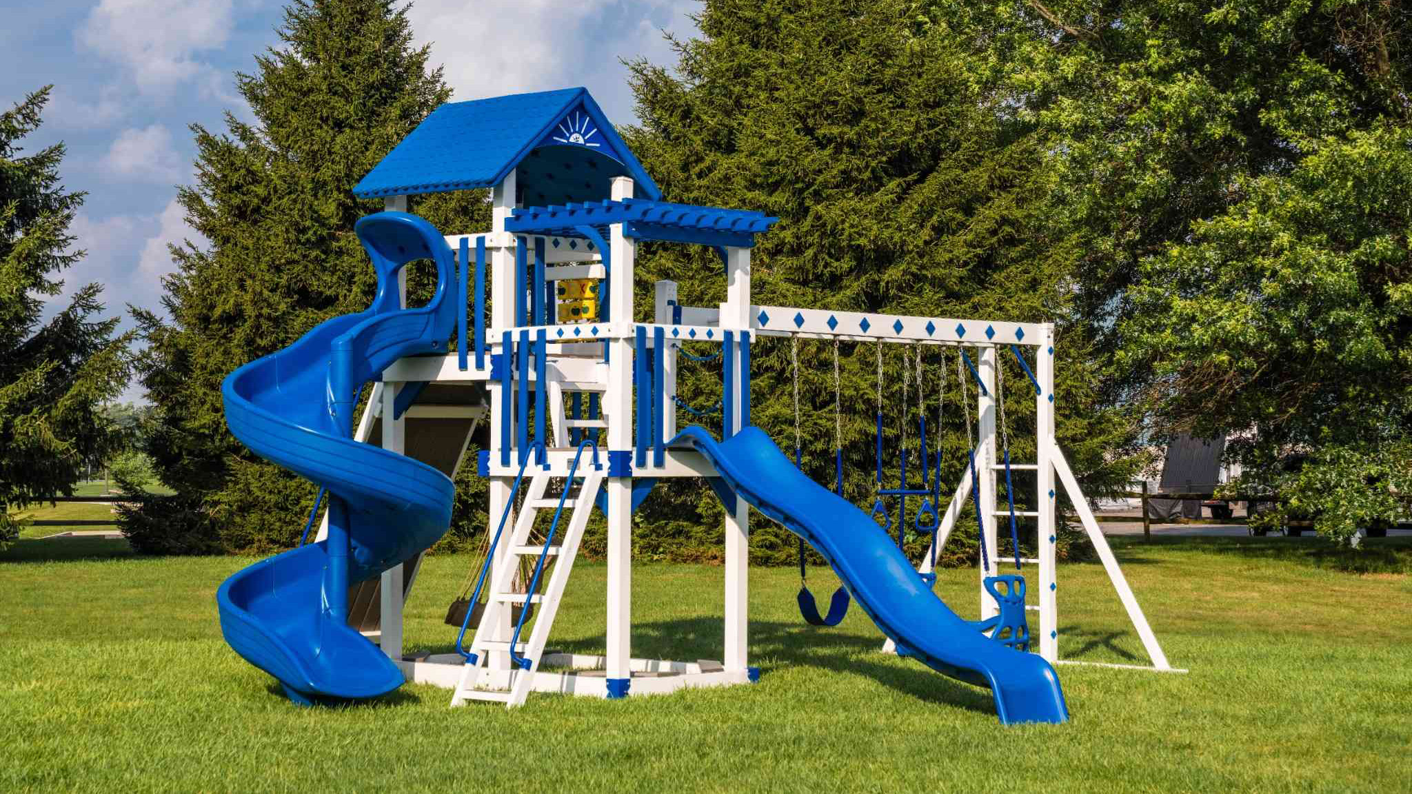 Captain's Castle vinyl playset with fort, swings, and slide